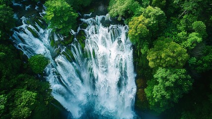 Wall Mural - a wonderful landscape of a huge waterfall from a bird's eye view, a picture made by artificial intelligence