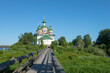 Ancient Cathedral of the Smolensk Icon of the Mother of God in a June landscape on a sunny day. Olonets, Karelia. Russia