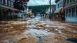 The aftermath of a flood in a small town, with water still covering roads and the first floor of buildings, a testament to the rain's relentless force