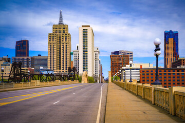 Wall Mural - St. Paul City in Minnesota, skyline, skyscrapers, and St. Paul City Hall over the Robert Street Bridge and Mississippi River in the Upper Midwestern United States
