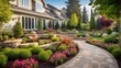 © Kashwat - Beautiful backyard landscaping in a residential property, featuring flower beds in the landscape design. Beautifully designed garden with a luxurious backyard in the summertime. Theme: nature