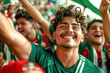 Mexican football soccer fans in a stadium supporting the national team, El Tricolor
