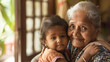 © Dirk - copy space, stockphoto, candid shot of an indian grandmother with her grandchild at home. Family theme, elderly grandmother together with her grandchild. Importance of love between generations. Old an