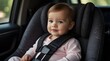 © Neelam - Happy baby girl in a car seat.generative.ai