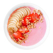 Healthy strawberry smoothie bowl with bananas and granola isolated on a white background