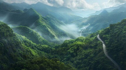 Wall Mural - A winding mountain road cutting through lush forests, disappearing into the misty peaks above, beckoning adventurers to explore the unknown.