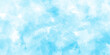 grunge Light blue background with watercolor, watercolor scraped grungy paper texture, Blue sky is surrounding with tiny clouds, blue and white watercolor paint splash or blotch with sky blue stains.