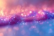 Abstract glittering bokeh background. Pink, blue, pastel purple, gold yellow colors. Holiday theme. 