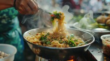 Thai Street Noodles: A Street Vendor Prepares A Steaming Bowl Of Flavorful Thai Noodles, Garnished With Fresh Herbs And Chili Flakes.