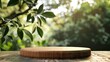 A wooden table with a round wooden board on top of it. The board is empty and has a natural, rustic feel to it. The table is surrounded by trees, giving the scene a peaceful, natural atmosphere