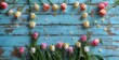 Colorful Tulips on Blue Wooden Background with Scattered Petals