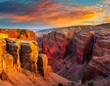 A dramatic canyon carved by the erosive forces of time, its sheer walls painted in hues of red and gold by the setting sun.