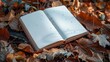 Blank Open Book in Autumn Leaves
