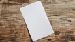 Blank white A4 paper isolated on wooden background