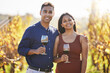 Couple, portrait and happy at vineyard with glass for wine tasting, hug and vacation in countryside. Man, woman and smile with drink, alcohol and date at farm in summer for holiday in California