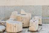 Fototapeta Desenie - Several carved marble fragments from an ancient archaeological site, in Athens Greece