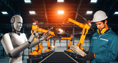 Wall Mural - MLB Mechanized industry robot and human worker working together in future factory. Concept of artificial intelligence for industrial revolution and automation manufacturing process.