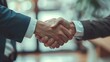 Firm Handshake Between Business Professionals