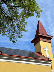 Wall Mural - Church with solar panels and tree