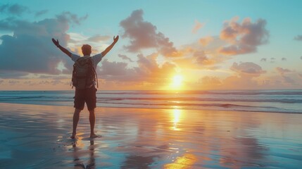 man raising arms up enjoying sunset on the beach looking morning sunrise - Self care, traveling, wellness and healthy life style concept