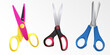 Set of scissors with handles of different colors. Tool for cutting paper, cardboard. Stationery with sharp blades.
