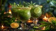   A tight shot of two glassware filled with liquids and adorned with green leaves and limes on a table