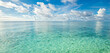 Crystal clear seascape. Perfect sunshine sky water of ocean. Blue sea transparent ocean water surface ripples waves calm and underwater with sunny and cloudy sky. Happy inspirational beauty in nature