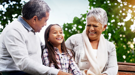 Sticker - Park, bench and grandparents with child, laughing and bonding on outdoor adventure together. Old man, senior woman and girl in backyard with love, happiness and family fun in nature with grandchild