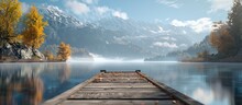 Lake And Wooden Pier Surrounded By Snow Mountains In Autumn. Nature Landscape Background.