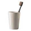 A black toothbrush in a white cup.