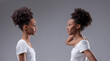 Self-critical black woman confronts own insecure reflection