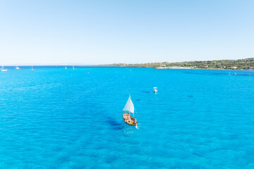 Wall Mural - sail yacht on the sea as a background. .sea and waves from top view. blue water background from top 