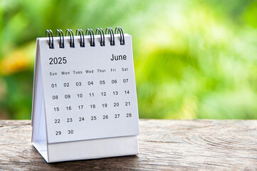 Wall Mural - June 2025 white table calendar with customizable space for text. Calendar concept and copy space.