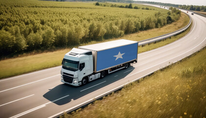 An Somalia-flagged truck hauls cargo along the highway, embodying the essence of logistics and transportation in the Somalia