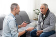 © Angelov - Elderly son takes care of ill father
