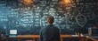 © Natthakan - A man is sitting in front of a chalkboard with equations on it