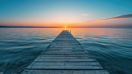 Wall Mural - Wooden pier on the sea at sunset with beautiful sky, a long wooden path leads into the distance over the calm water