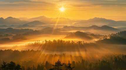 Wall Mural - Golden rays of dawn cascading over tranquil mountain ridges in a majestic sunrise panorama