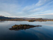 Wanaka, New Zealand: Aerial drone view of the Ruby island in Lake Wanaka in lake afternoon in New Zealand south island.