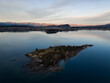 Wanaka, New Zealand: Aerial drone view of the Ruby island in Lake Wanaka in lake afternoon in New Zealand south island.