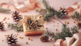 Fototapeta Tulipany - Congratulatory Christmas scene with a golden gift box, ribbon, and fir branches on an isolated pastel background. Top view, with soft studio lighting to highlight details