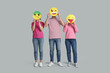© New Africa - People covering faces with emoticons on grey background
