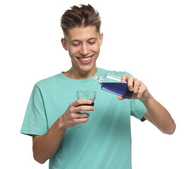 Canvas Print - Young man with mouthwash on white background