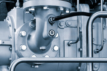 Poster - Part of an industrial metal machine with tubes and control levers