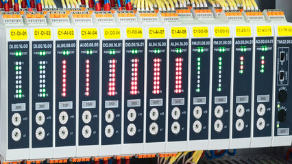 Poster - A row of computer cables with a clock on the left side.