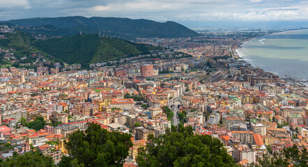 Wall Mural - Densely populated areas of the Italian city of Salerno. Salerno is a city and port on the Tyrrhenian Sea in southern Italy, the administrative center of the Salerno province of the Campania region.