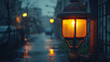 A lit streetlight on a wet urban evening.