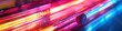 Colorful abstract panoramic background made of neon multicolored lines
