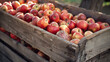 A wooden crate overflowing with freshly picked apples, each one shining with the promise of crisp sweetness.