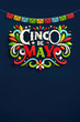 Bold Cinco de Mayo celebration design with festive typography and colorful papel picado on a dark background, perfect for flyers
